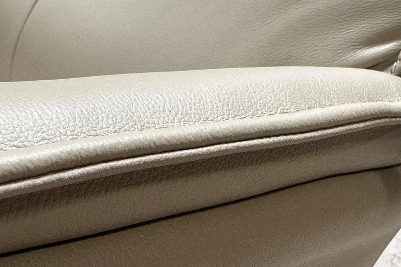 KAWOLA Relaxsessel JOSIANE Drehsessel Leder grau mit Hocker