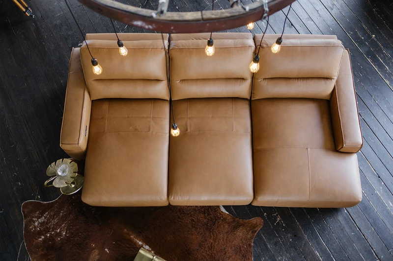 KAWOLA Big Sofa DORI motorischer Sitzvorzug Leder cognac